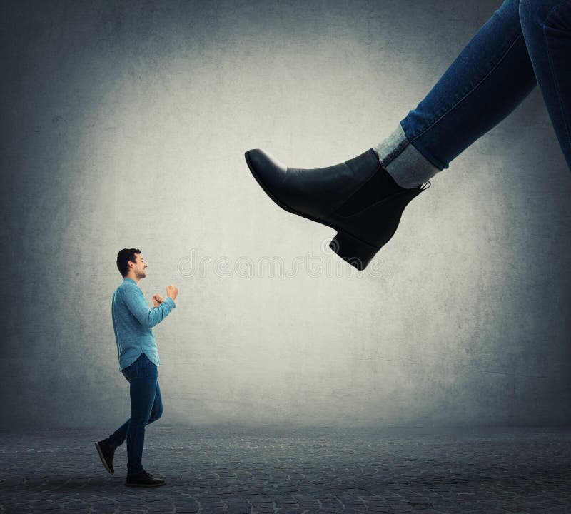 Henpecked young man stock photo Henpecked young man stock photo