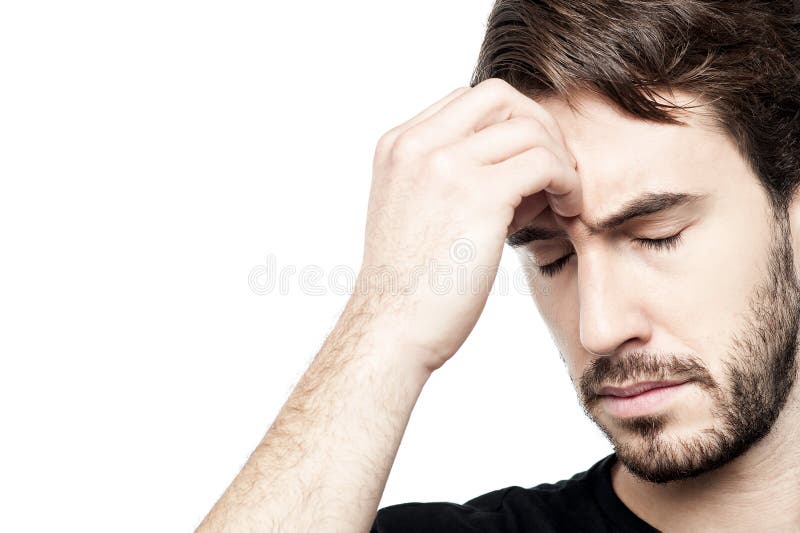 Young Man Holding Head in Hand Stock Photo - Image of upset, close