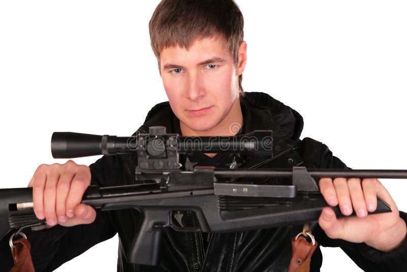 Young man holds sniper gun