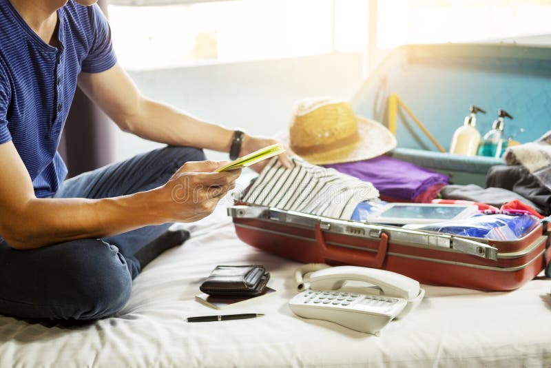 Young man hurring up to meeting and talking by phone and taking stock image Young man hurring up to meeting and talking by phone and taking stock image
