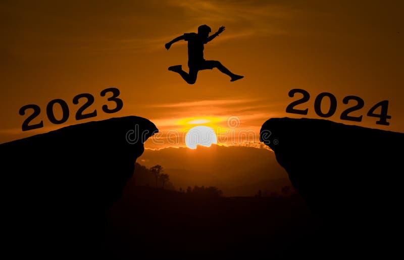 A Young Man Jump between 2023 and 2024 Years Over the Sun and through