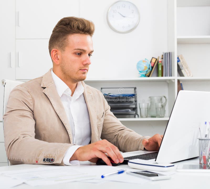 Young Man with Laptop in Office Stock Image Image of bureau