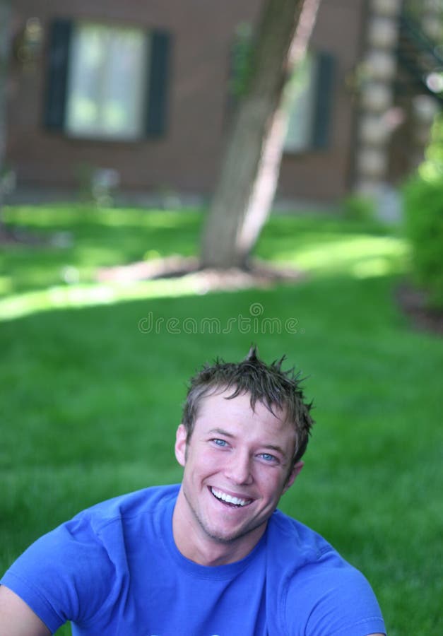 Young man with a laughing smile