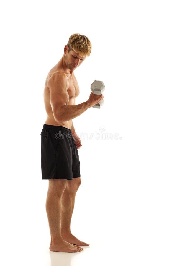 Young man lifting weights