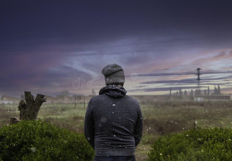 Young man looking at the horizon stock image