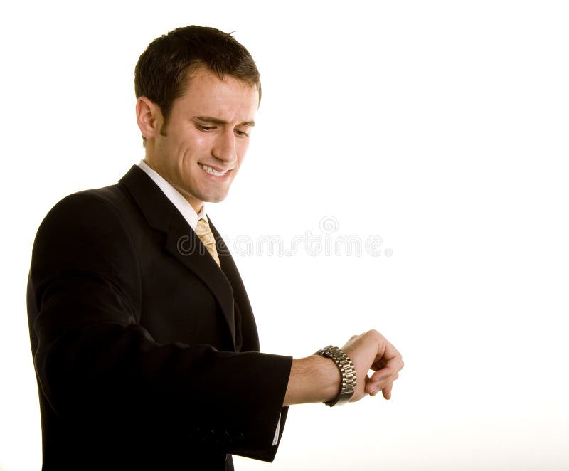 Young Man Looking at Watch stock photo. Image of handsome 7642960