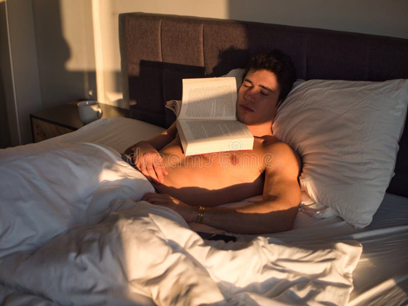 Shirtless Man in Bed Sleeping with a Book on Him Stock Image Image of
