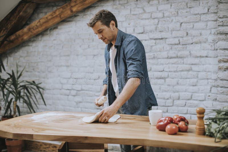 Young Man Making Dough in the Rustic Kitchen Stock Photo Image of