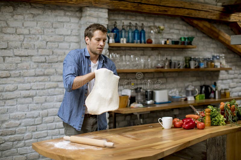 Young Man Making Dough in the Rustic Kitchen Stock Image Image of