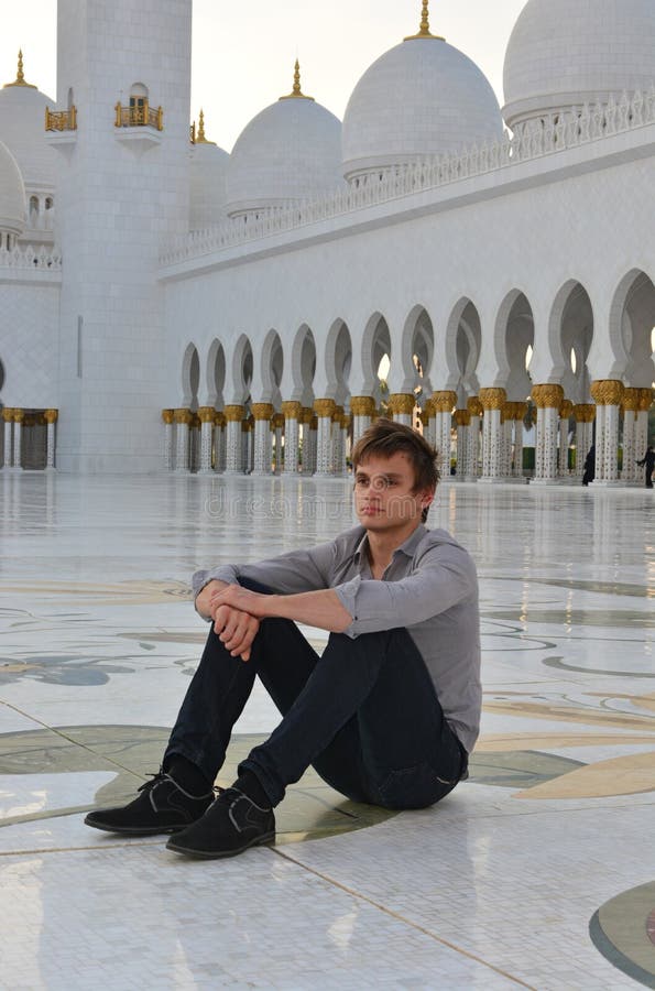 Young man in the mosque stock image. Image of column - 35756477