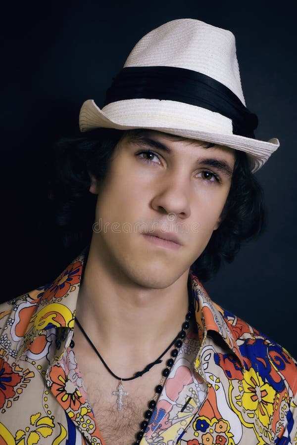Young Man In Multicolored Shirt And White Hat Stock Photo Image of