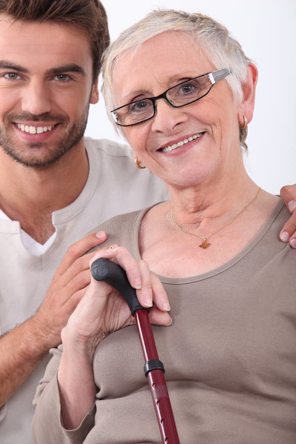 Young man and older woman stock image. Image of hugging - 35