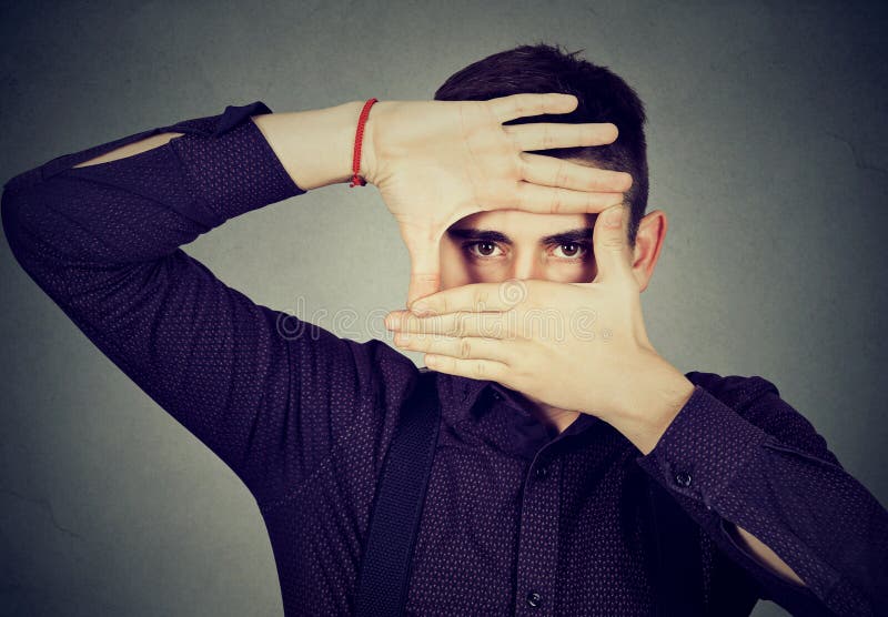 Young man covering his face with hands Royalty Free Vector