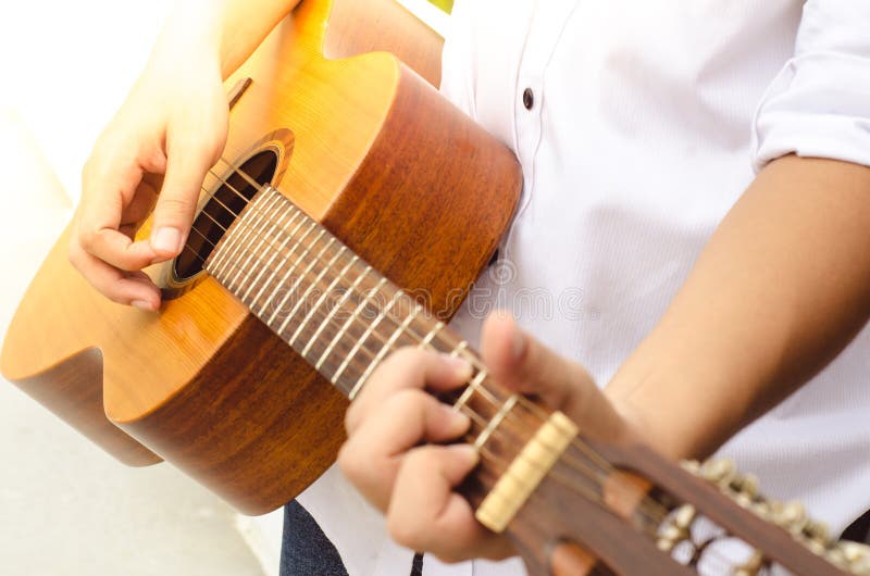 Young Man Playing Acoustic Guitar. Stock Photo - Image of lifestyle