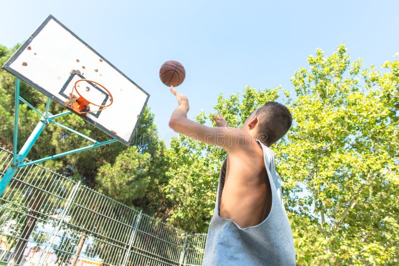 Boy Playing Basketball. Blue Background Stock Photo Image of hoops