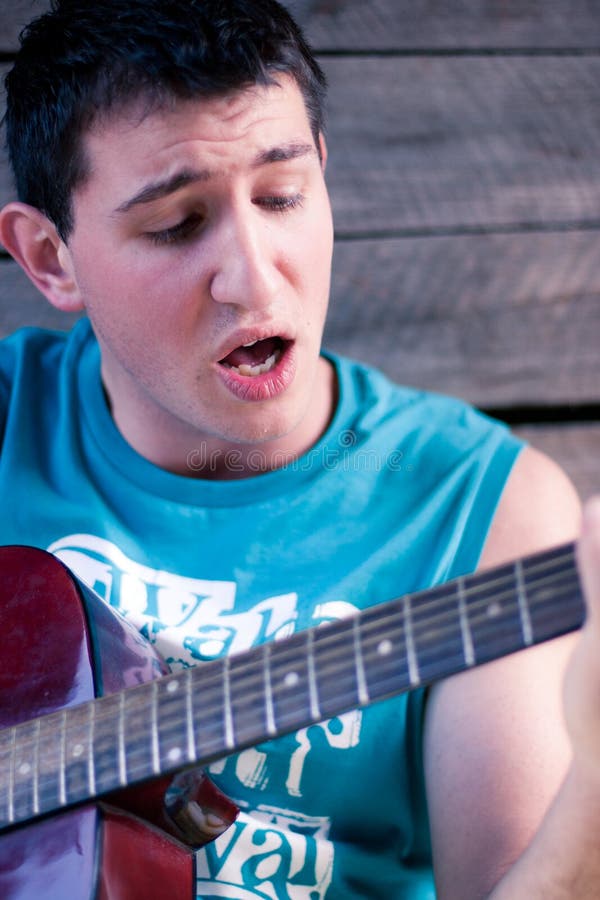 Young Man Playing The Guitar Stock Image Image of detail, acoustic