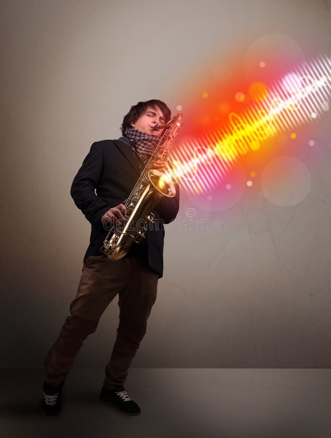Young Man Playing on Saxophone with Colorful Sound Waves Stock Image