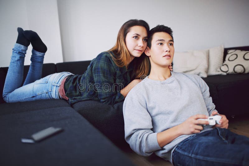 Couple playing games stock image. Image of girlfriend - 132760653