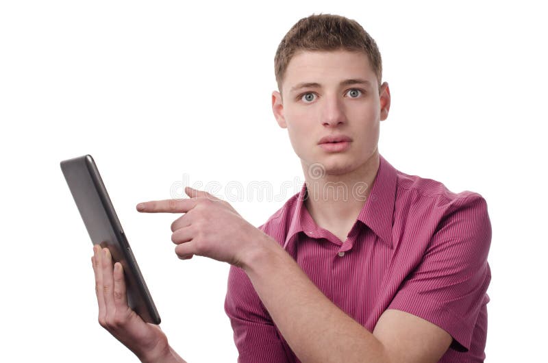 Young man pointing to a tablet. stock photos