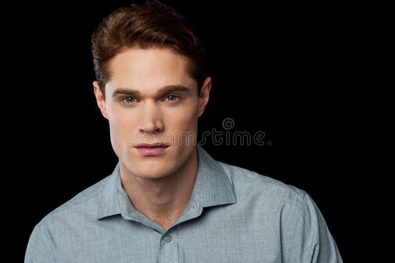 Young man posing over black stock photos