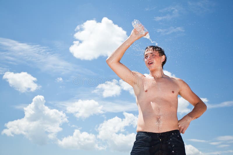 Young Man Pour on Head Fresh Water from Bottle Stock Image Image of