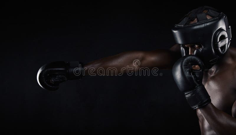 Young man practicing boxing