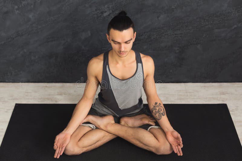 Young Man Practicing Yoga, Relax Meditation Pose Stock Image - Image of ...