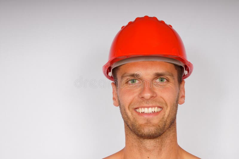 Young man in a protective helmet