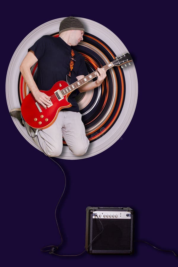 Young Man With The Red Guitar In The Jump On The Round Background Of Stretched Pixels. Male Rock Music Concept