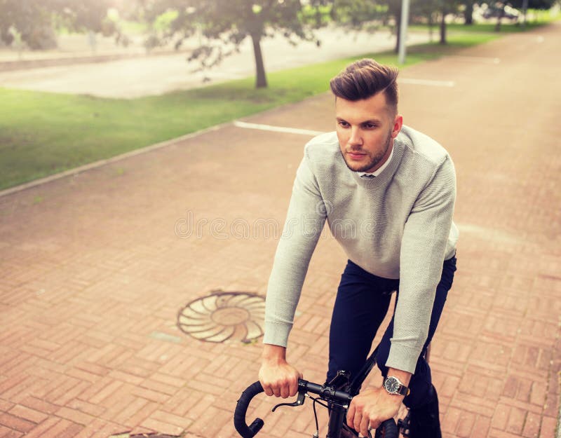 Man With Headphones Riding Bicycle On City Street Stock Image Image Of Biking Metrosexual