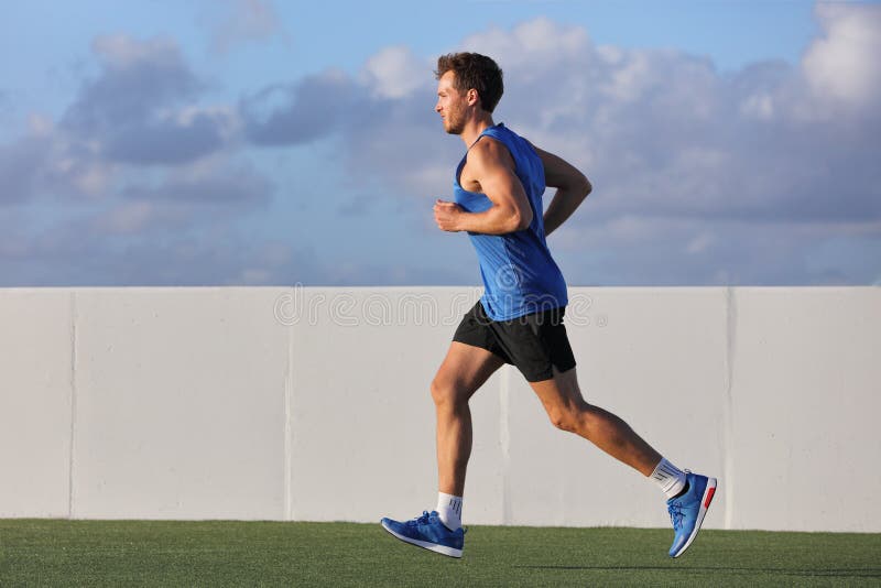 Athletic Sport Runner Man Running In Urban Training Stock Photo