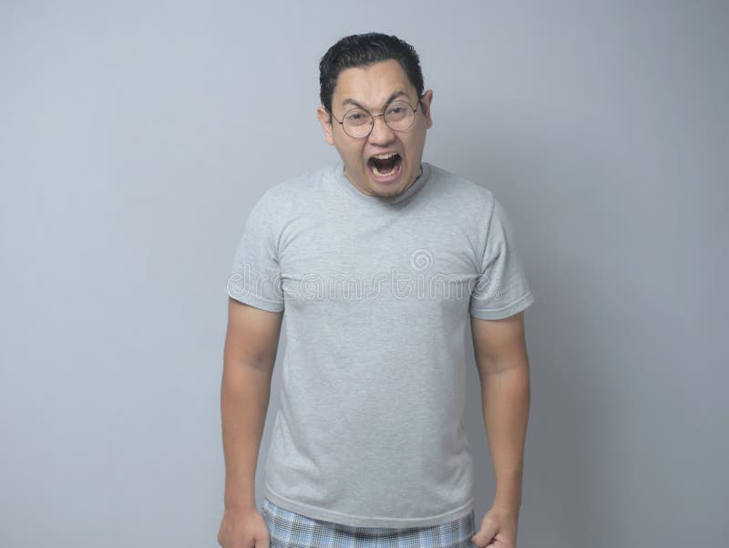 Surreptitious Gesture With The Head Young Man Shouting, Anger Gesture Stock Image - Image of emotion, head