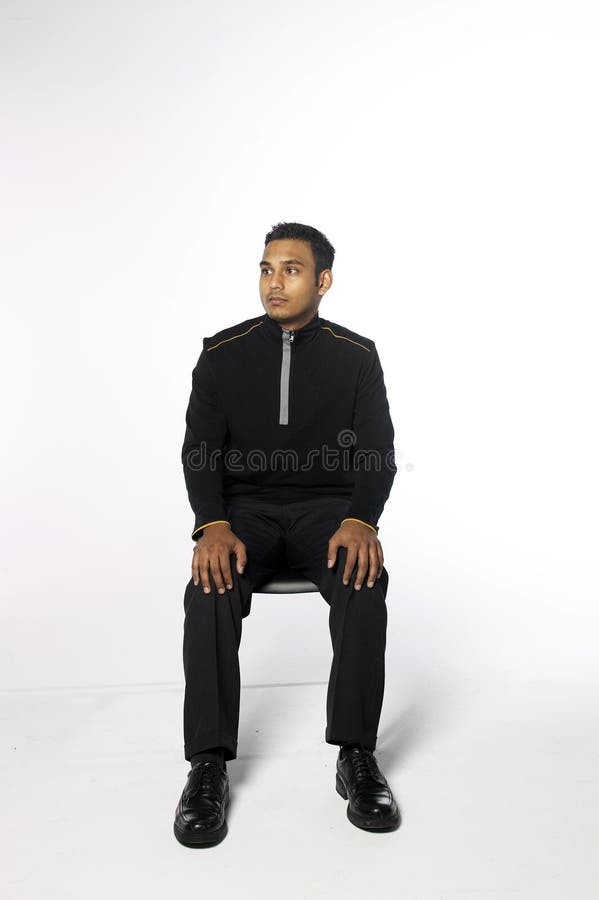 Young man sitting