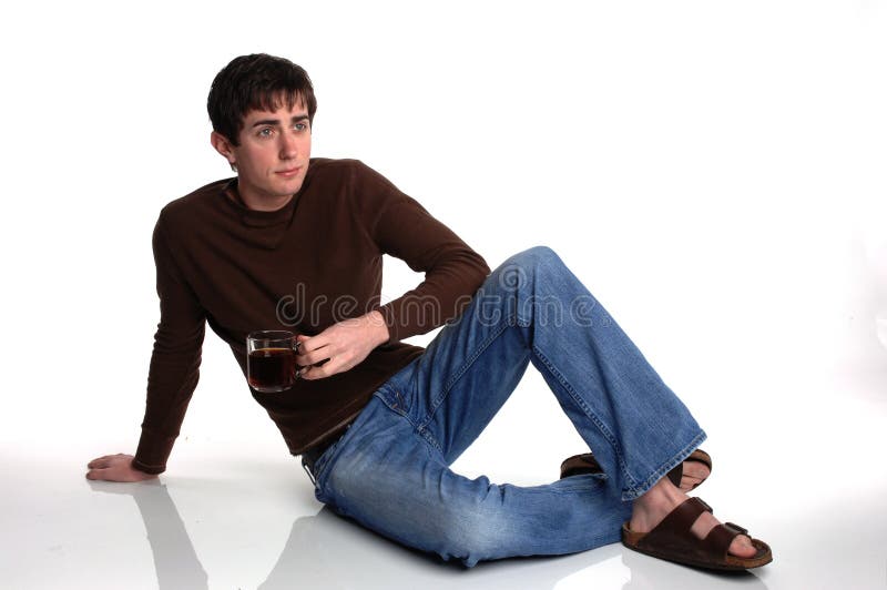 Young man sitting with coffee