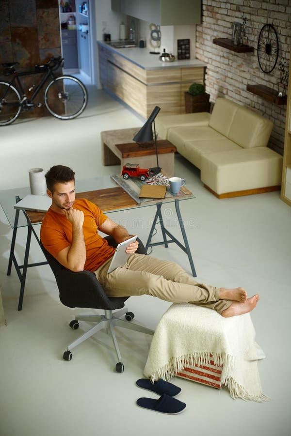 Young man in retro home royalty free stock images