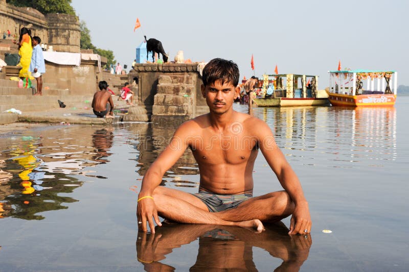 Young Man Sitting On Sacred River Narmada At Maheshwar Editorial Photo
