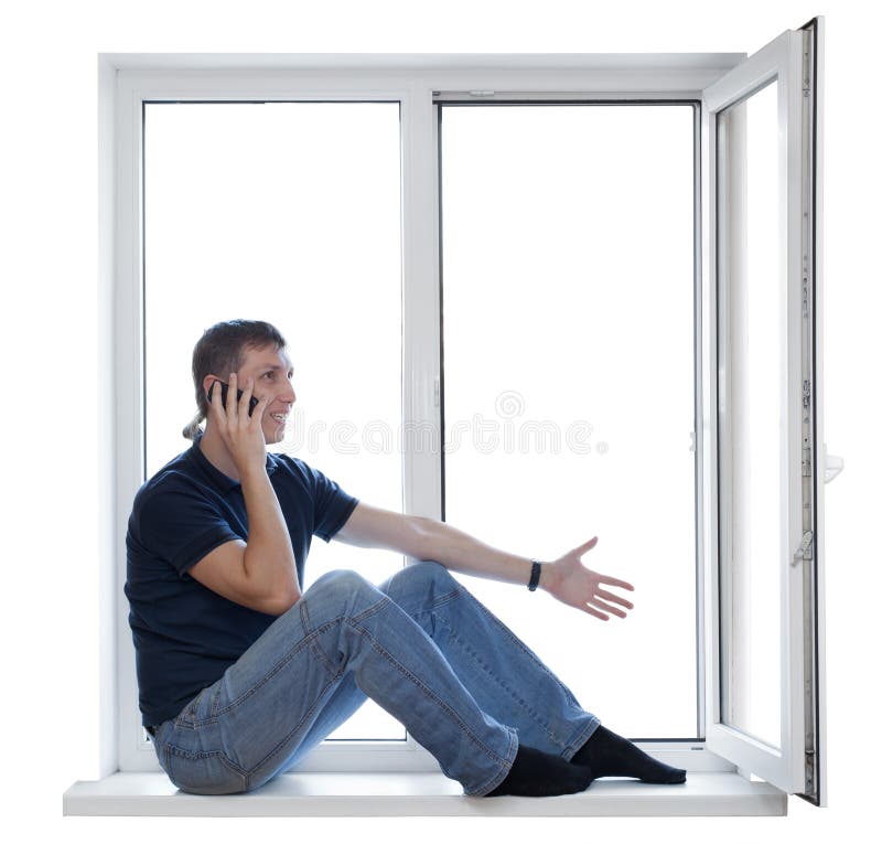 Free Stock Photo of Young Man sitting near window