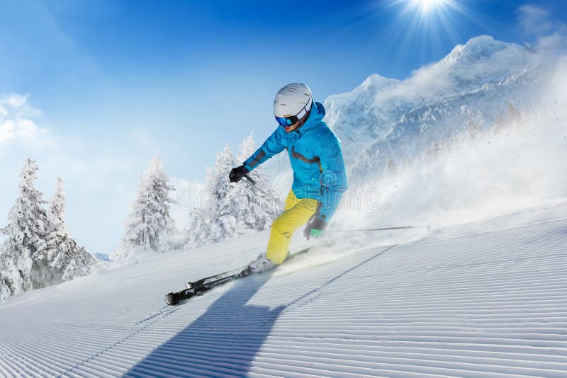 Young Man Skier Running Down the Slope in Alpine Mountains Stock Image ...