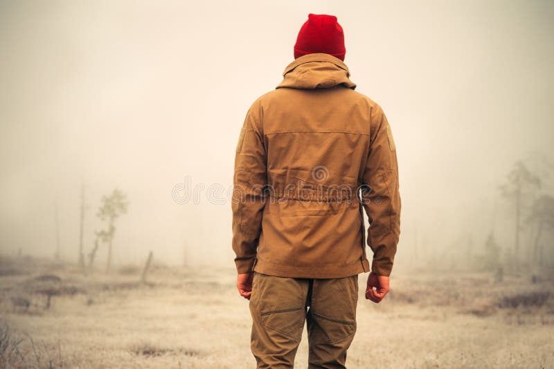 Young Man standing alone outdoor