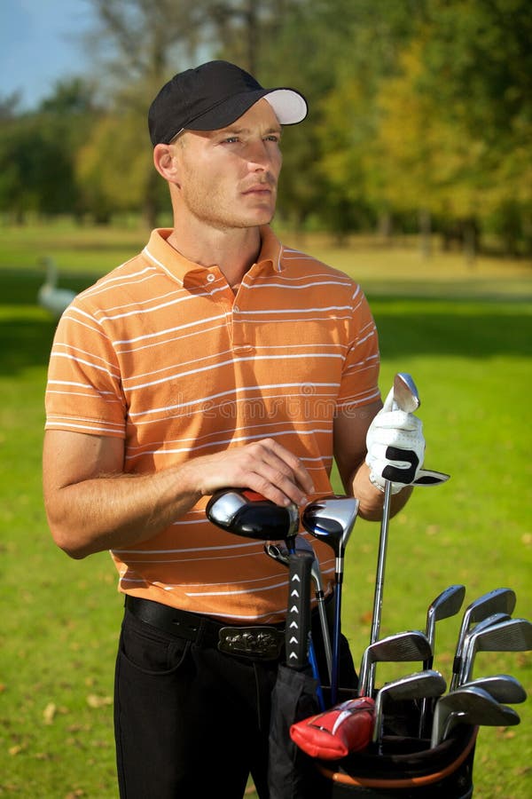 Young Man Standing by Golf Bag Full of Sticks Stock Photo Image of
