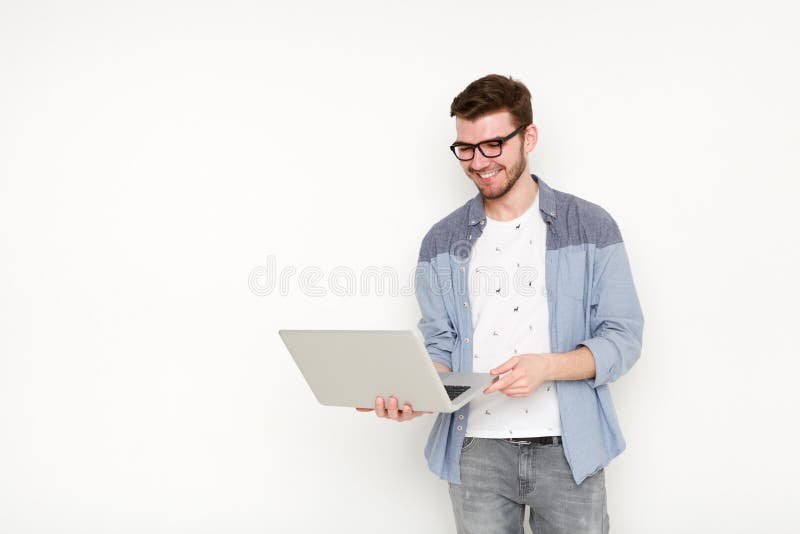 Young Man Standing with Laptop Stock Image - Image of idea, joyful ...