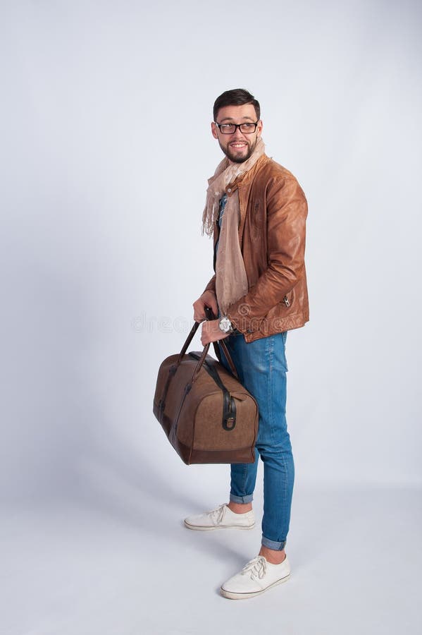 Young Man Standing with Travel Bag Stock Image - Image of color ...