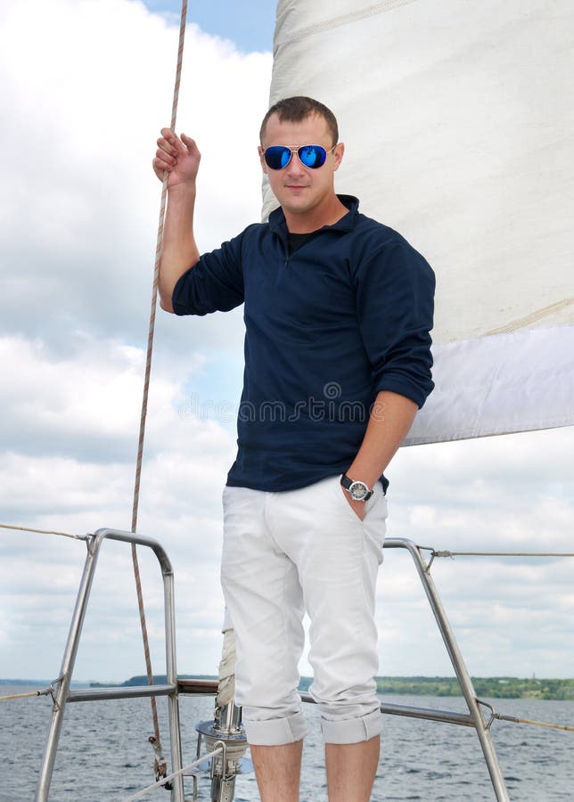 young man on a yacht