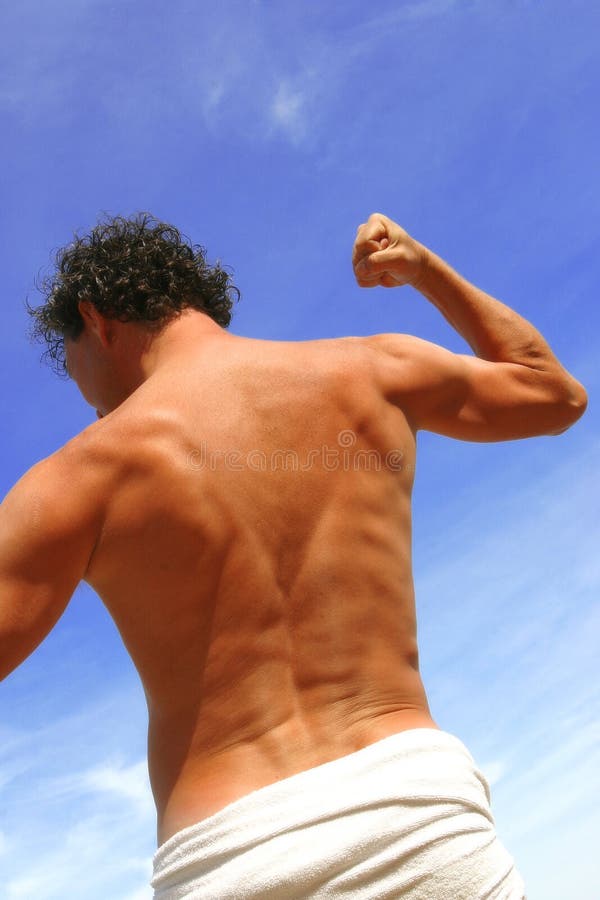 Young man stretching his arms stock images Young man stretching his arms stock images
