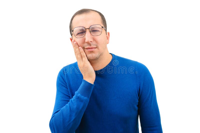 Young Man Suffering From Toothache Touching Cheek On White Background