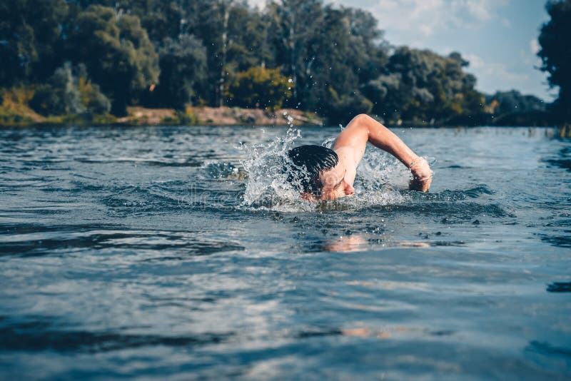 The Young Man Swimming in the River Stock Image Image of inhaling