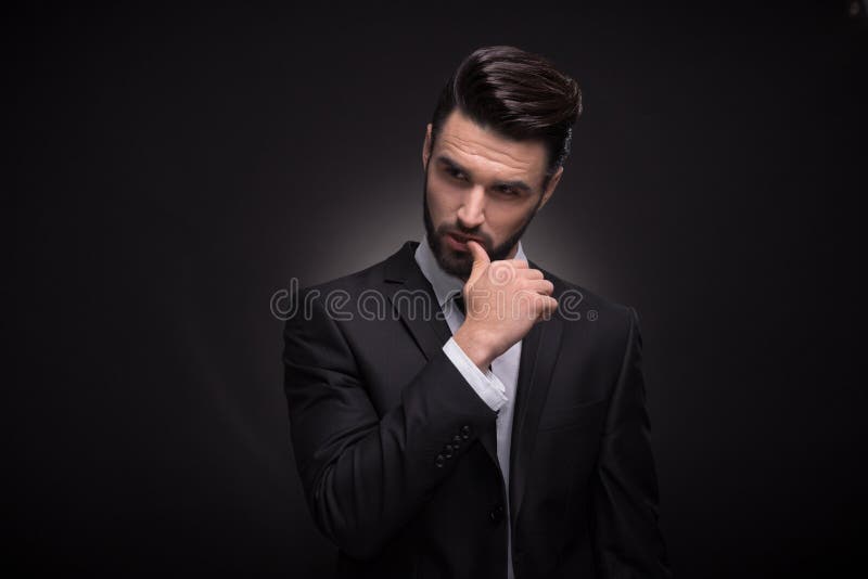 Young man, upper body, handsome posing suit elegant