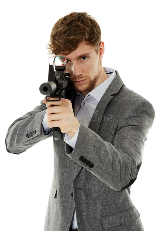 Young man using machine gun