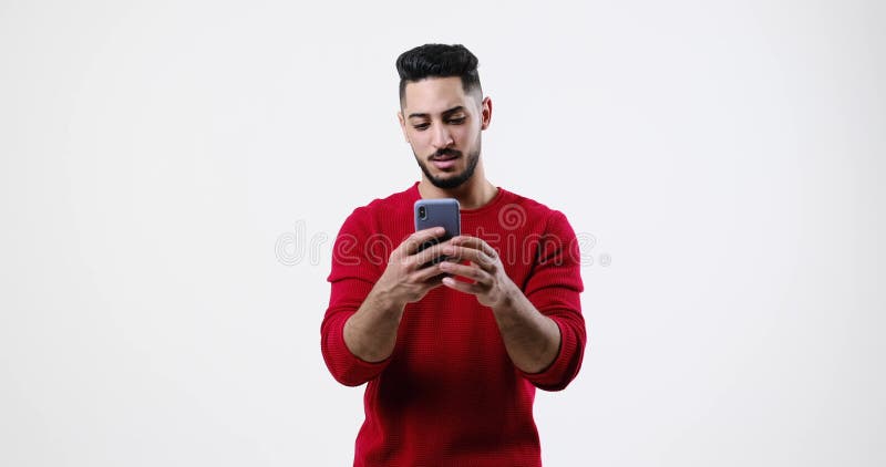 Young man using mobile phone stock footage