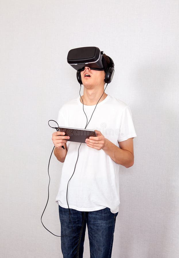 Young Man in VR Glasses